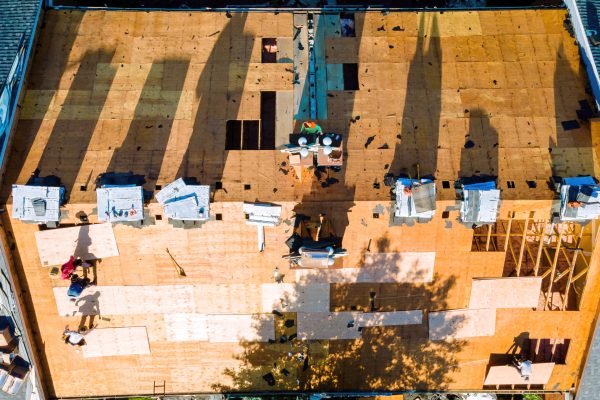 In order to repair roof of an apartment building, new shingles were installed and plywood was installed to replace old ones